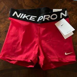 Red Nike pro shorts